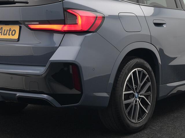 BMW X1 xDrive30e M-Sport Plug In Hybrid Storm Bay Metallic 326pk Dealer O.H. PHEV | Panodak | Lederen Sportstoelen Memory & Massage | Adaptive Cruise | Harman Kardon | Navigatie | 360 Camera | Head Up | Sfeerverlichting | Apple Carplay |