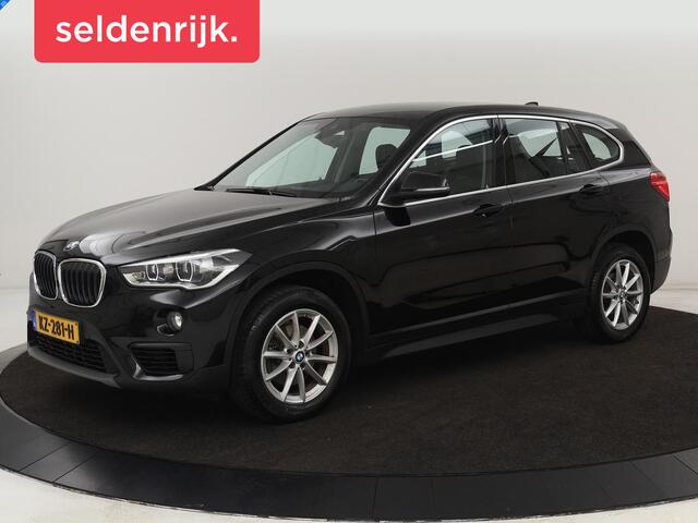 BMW X1 sDrive18i High Executive | Leder | Trekhaak | Harman/Kardon | Stoelverwarming | Head-Up | Full LED | Navigatie | Parkeerhulp | Climate control | Bluetooth