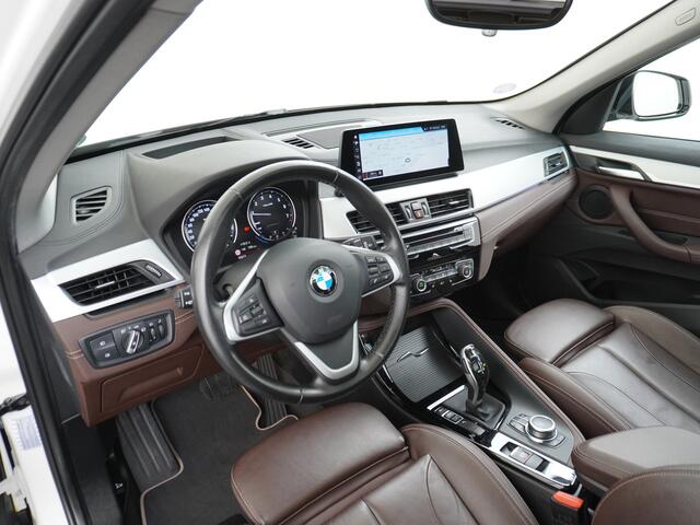 BMW X1 sDrive20i Automaat Leder Panoramadak Trekhaak Navi-Pro Ecc Cruise Control High Executive Sport Line Keyless Pdc Stoelverwarming Led Elek.Achterklep Privacy Glas Mooie complete auto!
