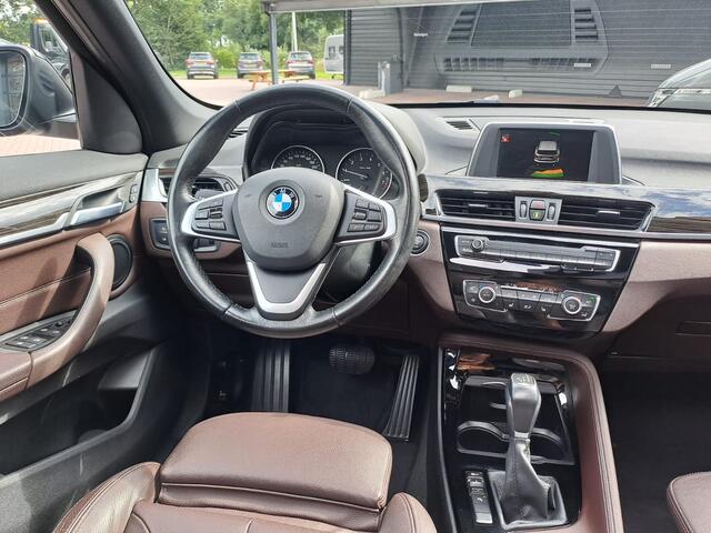 BMW X1 sDrive18i High Executive | Automaat | Leder | Pano | Trekhaak | Cruise | PDC | All-seasons |