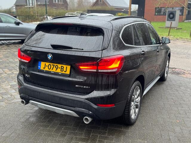 BMW X1 sDrive 2.0i 192pk autom ecc,beigeleer,lmv,navi,led,chroom,dglas,camera