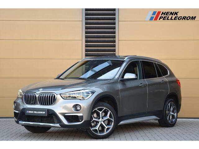 BMW X1 sDrive20i Orange Edition II * Sportstoelen * Panoramadak * Head-up * Trekhaak *