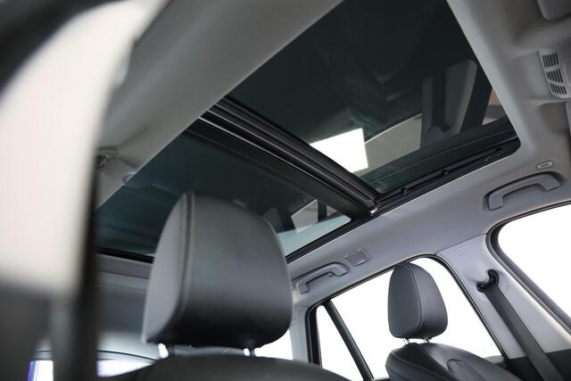 BMW X1 sDrive18i High Executive | Schuif-open dak | X-LINE | Leer | DAB+ | 19''