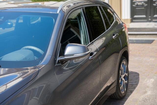BMW X1 xDrive20i High Executive TREKHAAK | PANO | ADAPTIVE | KEYLESS | CAMERA | STUURVERW
