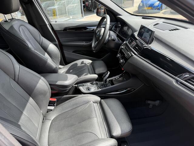 BMW X1 sDrive20i Orange Edition II AUTOMAAT| LEDER SPORT INTERIEUR| PANORAMADAK| CAMERA| NAVIGATIE| AIRCO/ECC | CRUISECONTROL| TREKHAAK| PARKEERSENSOREN
