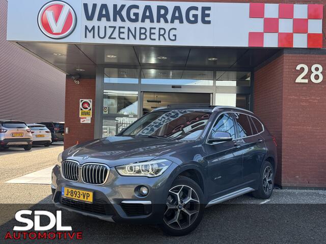 BMW X1 xDrive20i Executive // PANO / SCHUIF- KANTELDAK // NAVI // PDC V+A // CRUISE // TREKHAAK // ELEK. ACHTERKLEP //