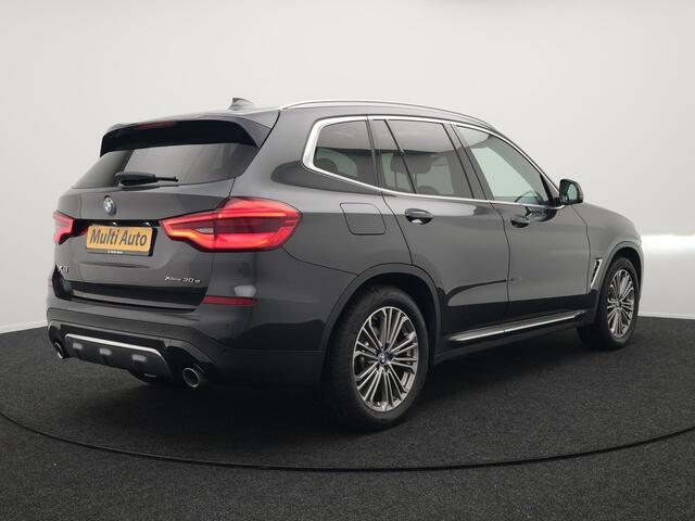 BMW X3 xDrive30e Luxury Line Plug In Hybrid 293pk PHEV | Trekhaak af Fabriek | Panodak | Adaptive Cruise | Lederen Sportstoelen Memory | 19"L.M | Sfeerverlichting | Keyless | Apple Carplay |