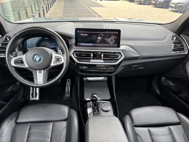 BMW X3 xDrive30e High Executive M Sport Automaat / Panoramadak / Trekhaak / Laserlight / Sportstoelen / Parking Assistant Plus / Comfort Access / Stuurverwarming