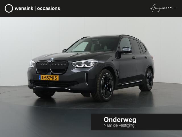 BMW X3 iX3 High Executive 80 kWh | M-Pakket | SOH 95% | Panoramadak | Adaptieve Cruise Control | Ele. verstelbare stoelen + geheugen | Sportstoelen | 360 Camera | Apple CarPlay/Android Auto | Trekhaak El. uitklapbaar | HUD |