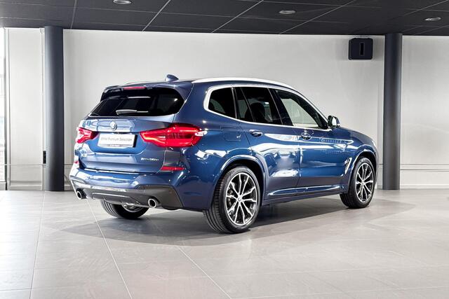 BMW X3 xDrive30e High Executive | M Sport | Glazen Panoramadak | Harman Kardon | Stoelverwarming | Trekhaak |