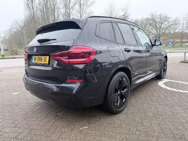 BMW X3 iX3 High Executive 80 kWh | Trekhaak | X3M look | Pano | Leer