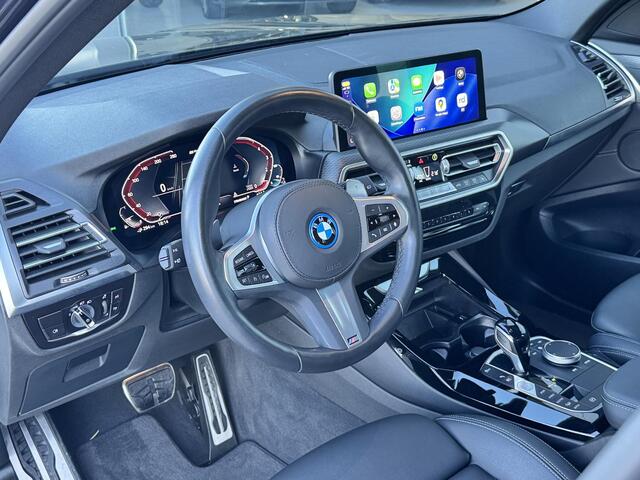 BMW X3 xDrive30e High Executive 292 PK | M sport | Groot navi scherm | Alarm | Carbon zwart | Camera