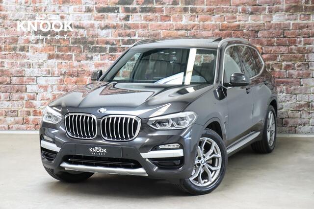 BMW X3 xDrive20i High Executive xLine Automaat / Panoramadak / Trekhaak / Navigatiesysteem Professional / Leder / Comfortstoelen Elektrisch Verstelbaar / Stuurwielverwarming / Chrome Line / Stoelventilatie / Hifi / Multifunctioneel Instrumentendisplay / LED /