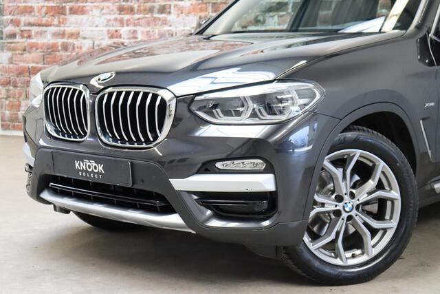 BMW X3 xDrive20i High Executive xLine Automaat / Panoramadak / Trekhaak / Navigatiesysteem Professional / Leder / Comfortstoelen Elektrisch Verstelbaar / Stuurwielverwarming / Chrome Line / Stoelventilatie / Hifi / Multifunctioneel Instrumentendisplay / LED /