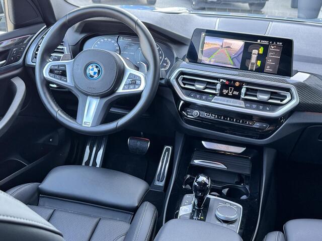 BMW X3 xDrive30e M sport 292 PK | Elek stoelen | Carbon | Laser | Keyless | Brooklyn grau metallic