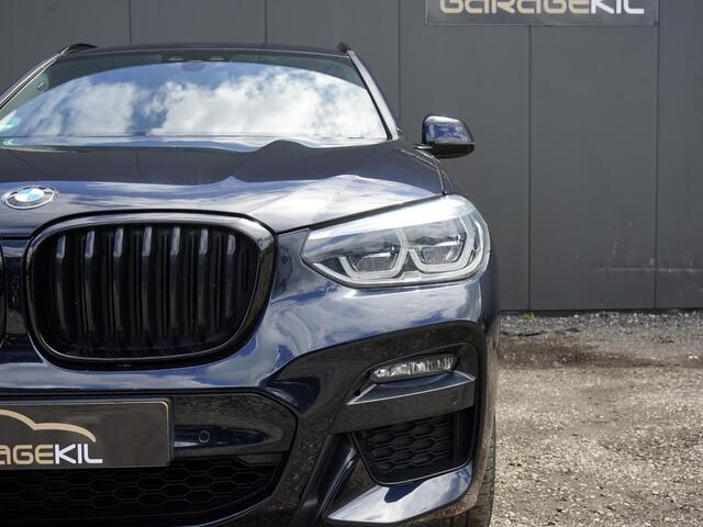 BMW X3 xDrive20i High Executive M-Sport / Elek. Trekhaak / Harman-Kardon / Shadow Line / Head-Up / Camera / Stoel + Stuur verw. /