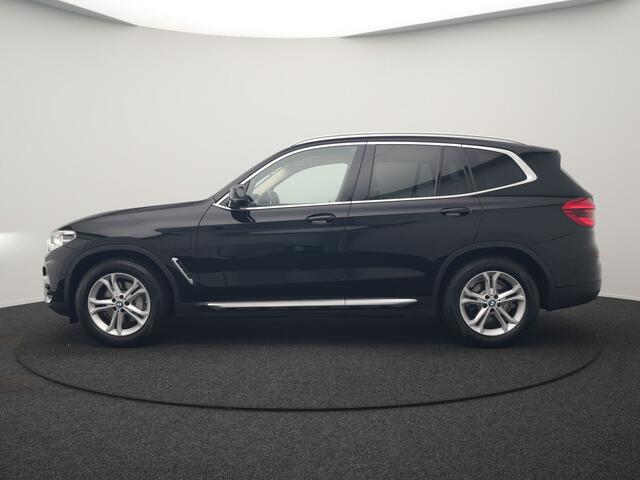 BMW X3 xDrive30e Business Edition Plus PHEV 293pk Dealer O.H. | Trekhaak Af Fabriek | Adaptive Cruise | 360 Camera | Adaptief Onderstel | Lederen Sportstoelen Memory & Ventilatie | Sfeerverlichting | Stoelen & Stuur Verwarmd | Keyless | Blis | Plug In Hybrid |