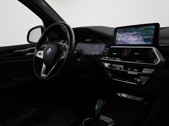BMW X3 iX3 HIGH EXECUTIVE 80 kWh + TREKHAAK | PANORAMA | 360 CAMERA | ADAPTIVE CRUISE | SFEERVERLICHTING