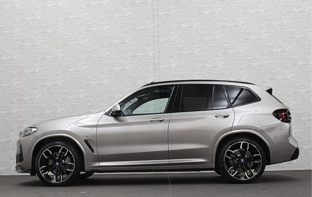 BMW X3 iX3 M-Sport 80 kWh | Panorama | 360 Camera | ACC | Leder | 99% SOH | Head-Up | Keyless-Entry | Harman-Kardon | Memory | Dodehoek | 3-Zone Clima | Sfeerverlichting | Carplay | ISO-Glas | Draadloos Laden | Bovag Garantie |