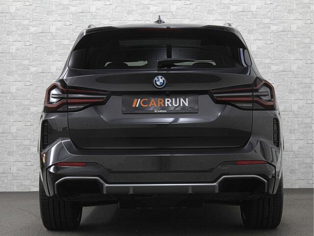 BMW X3 iX3 M-Sport | Sophisto Grey! | Panorama | ACC | Leder | Memory | El. Trekhaak | 97.6% SOH | Sfeerverlichting | 3-Zone Clima | Carplay | LED | Btw auto, 35250,= ex. | Rijklaar incl. Bovag garantie!