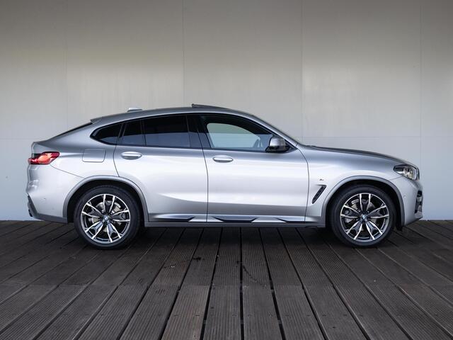 BMW X4 xDrive20i | High Executive | M Sportpakket | Parking Pack | 20'' | Comfort Access | Panoramadak | Stoelverwarming | Head-Up Display | Harman Kardon