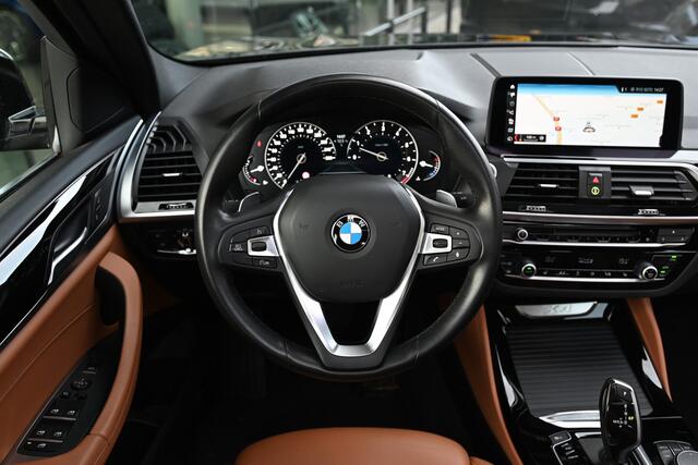 BMW X4 xDrive20i High Executive xLine Automaat / Trekhaak / Panoramadak / Sportstoelen / M Sportonderstel / LED / Parking Assistant Plus / Stoelverwarming / Navigatiesysteem Professional