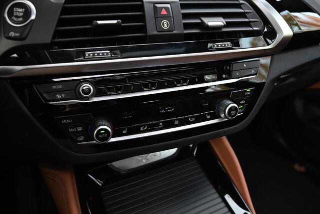 BMW X4 xDrive20i High Executive xLine Automaat / Trekhaak / Panoramadak / Sportstoelen / M Sportonderstel / LED / Parking Assistant Plus / Stoelverwarming / Navigatiesysteem Professional