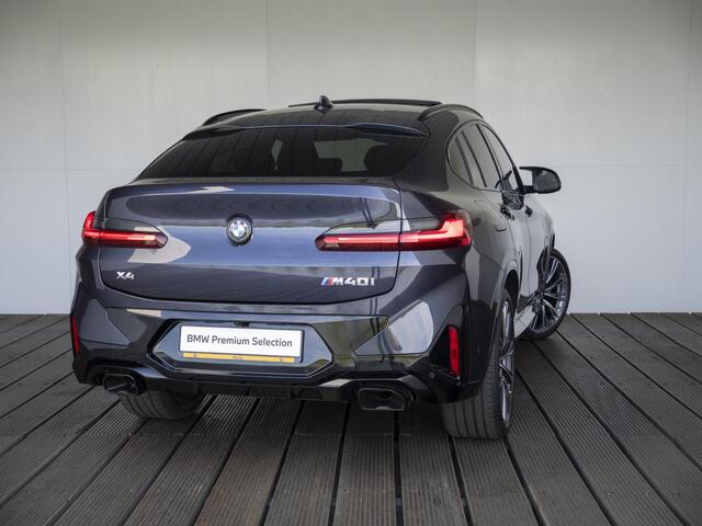 BMW X4 M40i | High Executive | M Sport Plus Pack | Macaoblauw | Stuurwielrand verwarmd | Comfort Access | Panoramadak | Head-Up Display | Harman Kardon | 21''