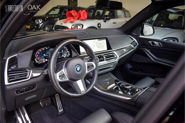 BMW X5 xDrive45e M-Sport | Live Cockpit | Panorama SkyLounge | H&K | 360 Camera | Leder | Trekhaak | Head-Up | ACC | 22" | Saphire Zwart