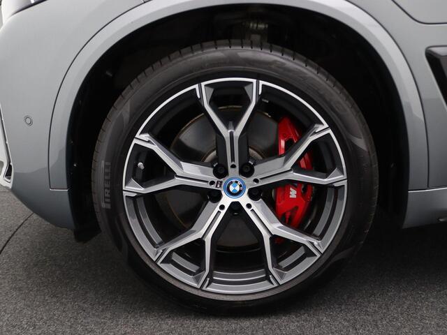 BMW X5 xDrive50e M Sportpakket Pro | Travel Pack | Innovation Pack | Comfort Pack | Adaptief onderstel met luchtvering op voor- en achteras | Trekhaak | Panoramadak | Driving Assistant Professional | Parking Assistant Professional | Harman Kardon | 21''