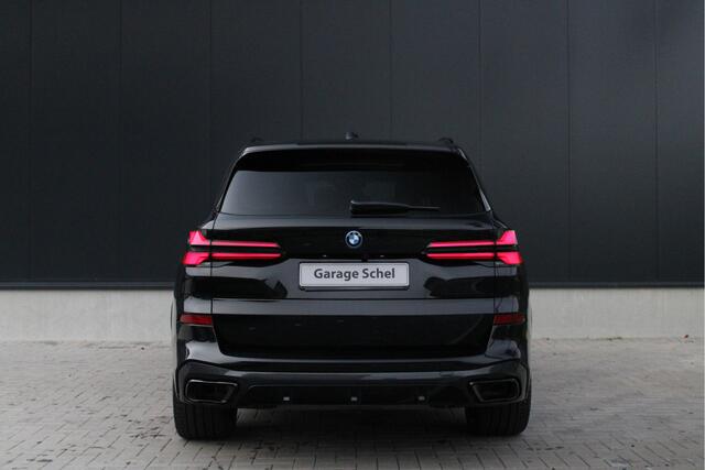 BMW X5 xDrive50e M Sport - Pano - Luchtvering - Trekhaak - Massage - 4wiel besturing - Carbon Pack - Softclose - Stoelverwarming/Koeling - Rijklaar