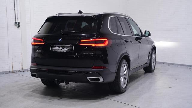 BMW X5 xDrive45e High Executive DAB-ontvangst apple carplay camera verwarmde en geventileerde comfort voorstoelen met memory driving-assist private-glas 19"-inch lmv zwarte hemelbekleding elektrische stuurkolom trekhaak