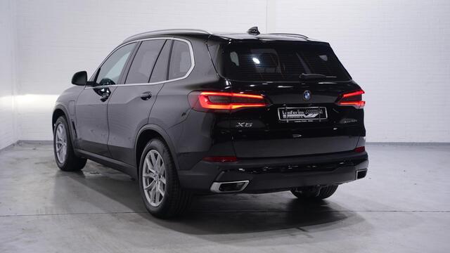 BMW X5 xDrive45e High Executive DAB-ontvangst apple carplay camera verwarmde en geventileerde comfort voorstoelen met memory driving-assist private-glas 19"-inch lmv zwarte hemelbekleding elektrische stuurkolom trekhaak