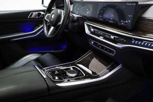 BMW X5 xDrive50e | PANORAMADAK | ACHTERBANKVERWARMING | INDIVIDUAL VOLLEDER MERINO | HEAD UP | 360 CAMERA | MAXTON | 22"