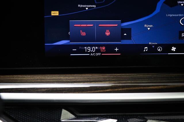 BMW X5 xDrive50e | PANORAMADAK | ACHTERBANKVERWARMING | INDIVIDUAL VOLLEDER MERINO | HEAD UP | 360 CAMERA | MAXTON | 22"