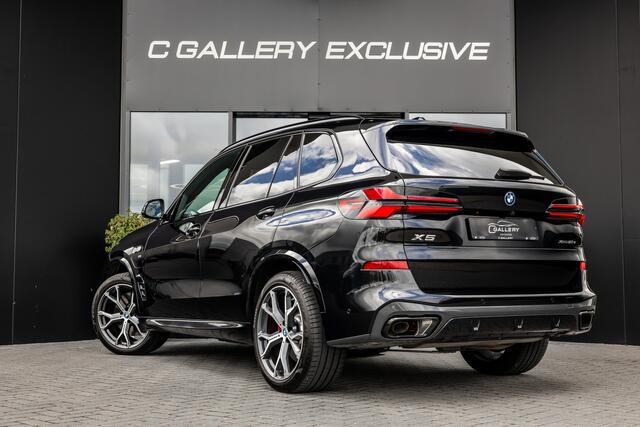 BMW X5 xDrive50e - M Sport Pro | Skylounge | B&W | Kuipstoelen | Luchtvering