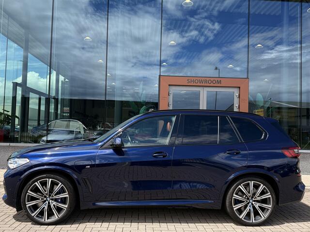 BMW X5 xDrive45e M-Sport Individual | ACC | H/K | Skylounge | Stoelverwarming \ verkoeling | Stuurverwarming | HUD | Luchtvering | Massage | Soft close | Laser | 22' Velgen | Afn. Trekhaak |