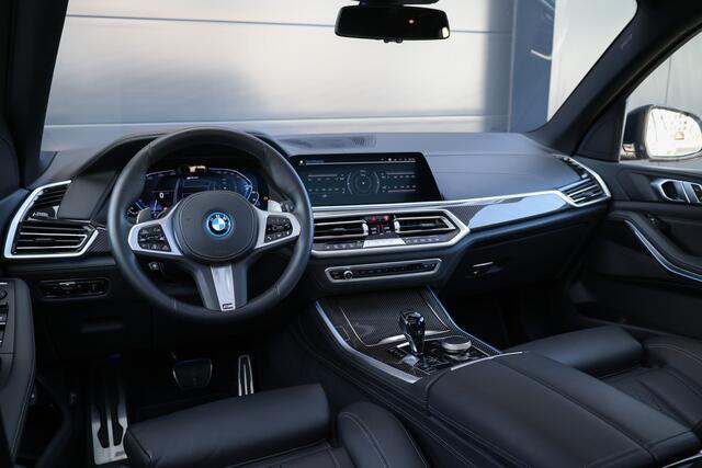 BMW X5 xDrive45e High Executive | BTW | M-SPORT | HUD | 4WIELSTUURING | SKYLOUNGE | CABRON | 22'' | ACC | DEALER ONDH | 360 |
