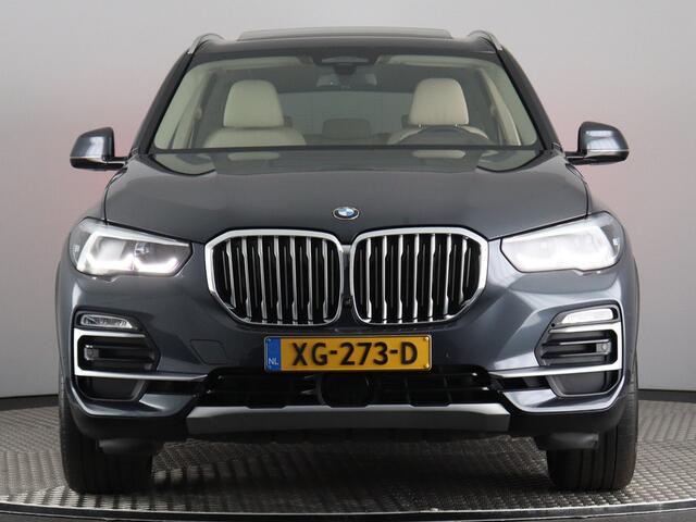 BMW X5 xDrive40i High Executive (NL-Auto / Skylounge / Luchtvering / 4Wiel sturing / 3D Camera / Stoelverw. + Koeling / Softclose / H&K / Vol!)