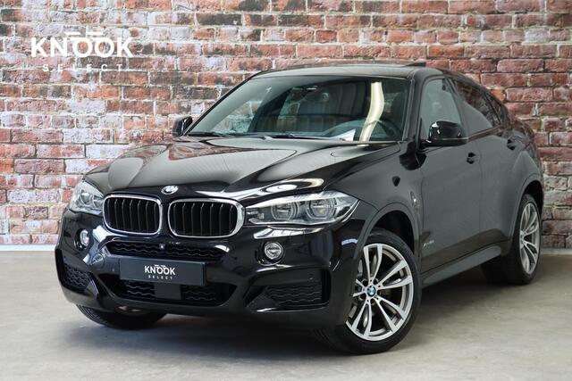 BMW X6 xDrive35i High Executive M Sport Pakket Automaat / Navigatiesysteem Professional / Driving Assistant Plus / Schuif-/kanteldak / Trekhaak / Adaptief M-onderstel / Comfortstoelen / Head-Up Display / Adaptieve LED-koplamp / Shadow Line / 20 Inch / Extra Geti