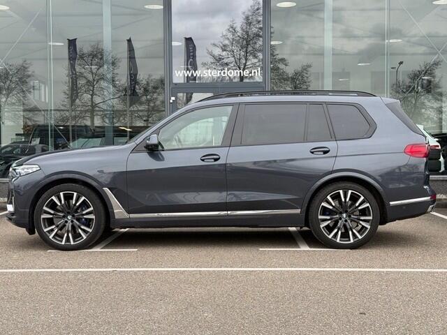 BMW X7 xDrive40i 6p. l 340 PK l Panodak Skylounge l LASER l HUD l 3500 Ahw gewicht l Memory l B &W l 360 Camera l Stuurverw. l Stoelverwarming l Distronic l