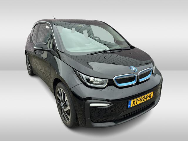 BMW i3 Basis 120Ah 42 kWh / Navigatie / 19'' / Parkeerhulp achter / Navigatie / Harman Kardon / Stoelverwarming / Cruise Control / Warmtepomp / Getint glas