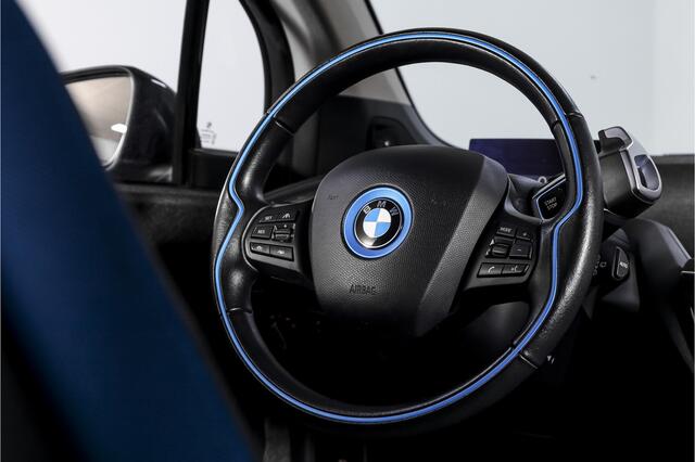 BMW i3 Basis 94Ah 33 kWh | S/k-panodak | Harman/Kardon | Dig. Cockpit | Adapt. cruise | Stoelverw. | PDC | Camera | NAV | ECC | LM 20" |