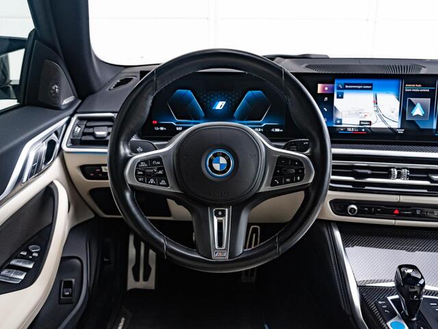 BMW i4 Gran Coupé M50 M-Sportpakket | M-Performance Parts | Trekhaak | 20 inch | Individual interieur | Carbon exterieur pakket