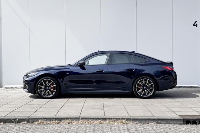 BMW i4 M50 High Executive Stuurwielrand Verwarming/ Stoelverwarming / Adaptief Onderstel / Comfort Acces / Shadow Line Koplampen / Glazen Schuifdak / Getinte Ramen / Dimmende Binnen & Buitenspiegel / Electrisch Verstelbare Voorstoelen / Driving Assistant Prof /