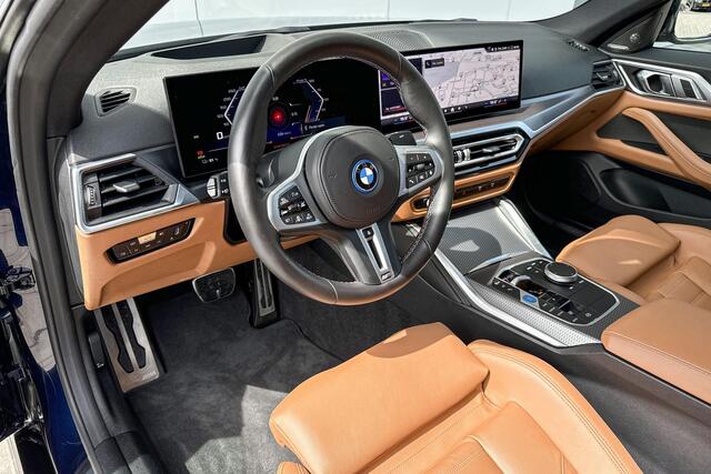 BMW i4 M50 High Executive Stuurwielrand Verwarming/ Stoelverwarming / Adaptief Onderstel / Comfort Acces / Shadow Line Koplampen / Glazen Schuifdak / Getinte Ramen / Dimmende Binnen & Buitenspiegel / Electrisch Verstelbare Voorstoelen / Driving Assistant Prof /