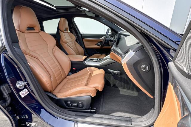 BMW i4 M50 High Executive Stuurwielrand Verwarming/ Stoelverwarming / Adaptief Onderstel / Comfort Acces / Shadow Line Koplampen / Glazen Schuifdak / Getinte Ramen / Dimmende Binnen & Buitenspiegel / Electrisch Verstelbare Voorstoelen / Driving Assistant Prof /