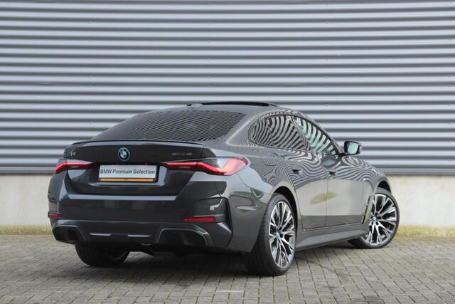 BMW i4 eDrive40 | High Executive / M Sportpakket Pro / Panodak / Driving Assistant Prof. / Harman Kardon / M Sportstoelen / Trekhaak | Easter