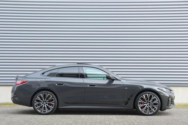BMW i4 eDrive40 | High Executive / M Sportpakket Pro / Panodak / Driving Assistant Prof. / Harman Kardon / M Sportstoelen / Trekhaak | Easter