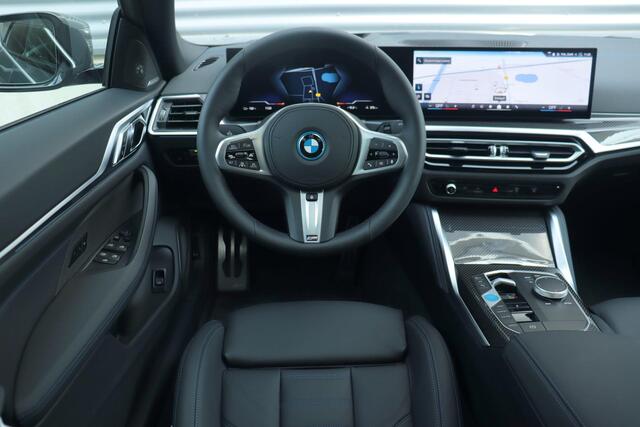 BMW i4 eDrive40 | High Executive / M Sportpakket Pro / Panodak / Driving Assistant Prof. / Harman Kardon / M Sportstoelen / Trekhaak | Easter